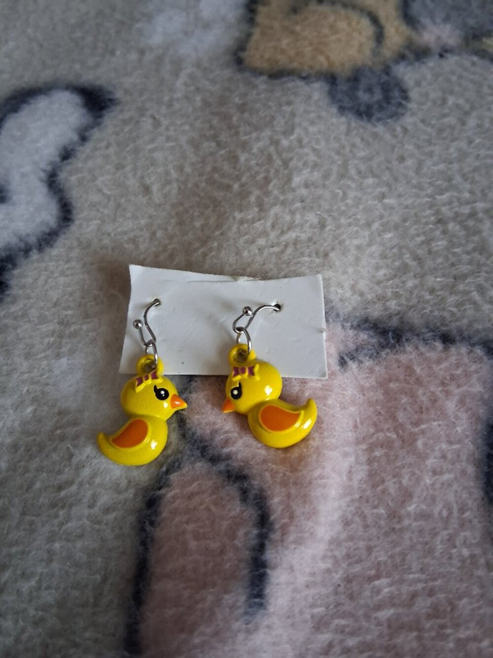 playful duck earrings